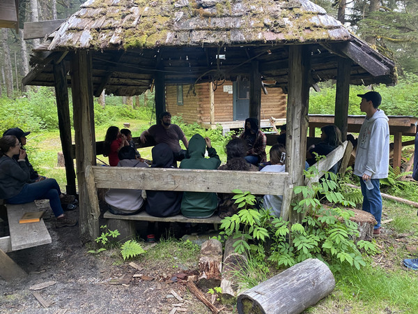 Students learn about traditional harvesting and processing. (Photo courtesy of Goldbelt Heritage Foundation)