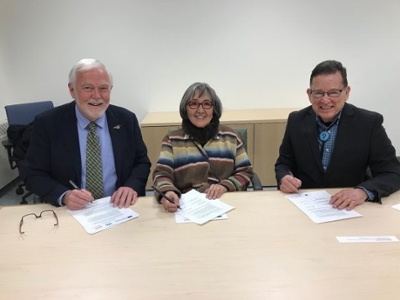 UAS Chancellor, Dr. Rick Caulfield joins SHI President, Dr. Rosita Worl, and IAIA President, Dr. Robert Martin on January 9 to sign the new MOA between the three organizations. Photo by Kari Groven, courtesy of Sealaska Heritage Institute.