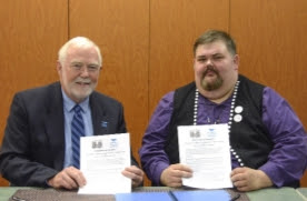 UAS Chancellor Caulfield and President Peterson following MOA signing ceremony