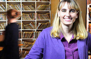 Person standing in front of medical records