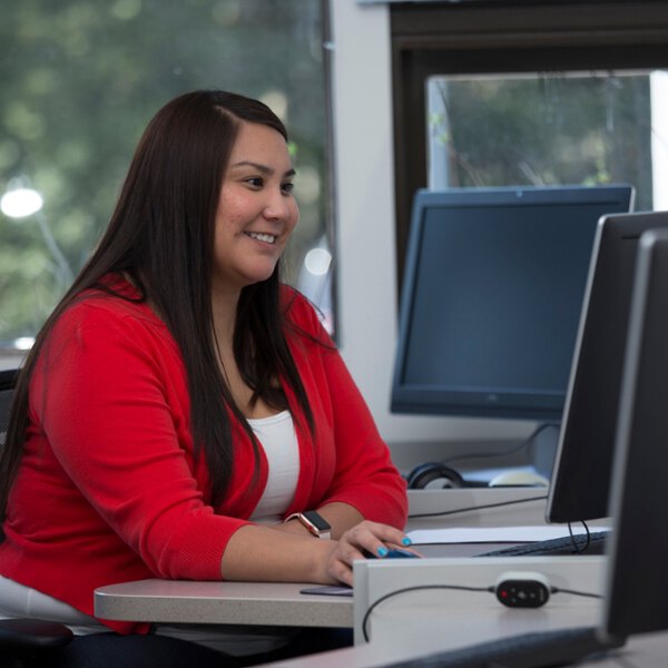 Woman works at a computer