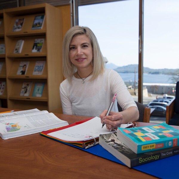 Woman doing coursework in the Ketchikan library