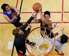 Students playing basketball