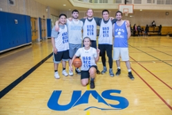 Intramural basketball team in gym